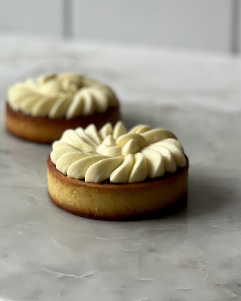 Blueberry Frangipane Tart on a concrete counter